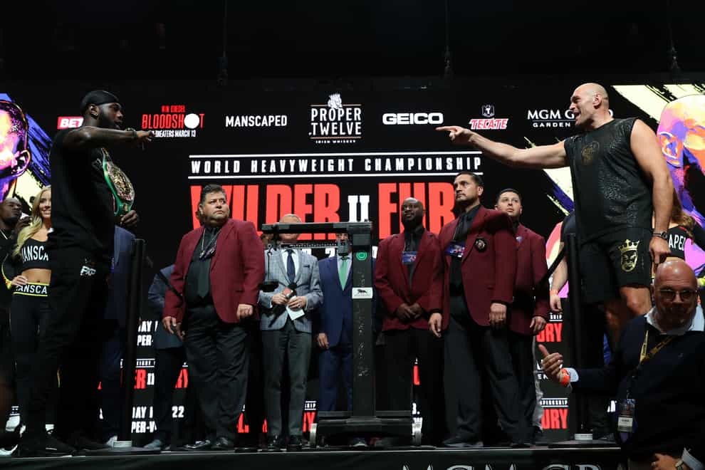 Tyson Fury and Deontay Wilder face off