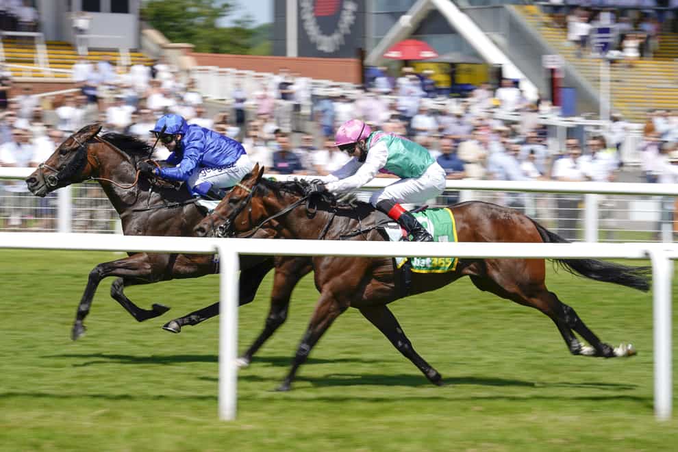 Real World accelerates past Derab to win the bet365 Stakes at Newbury under Marco Ghiani