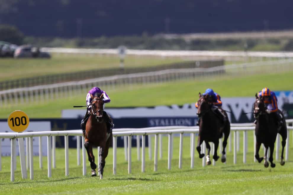 Snowfall puts daylight between herself and her rivals to win the Juddmonte Irish Oaks at the Curragh