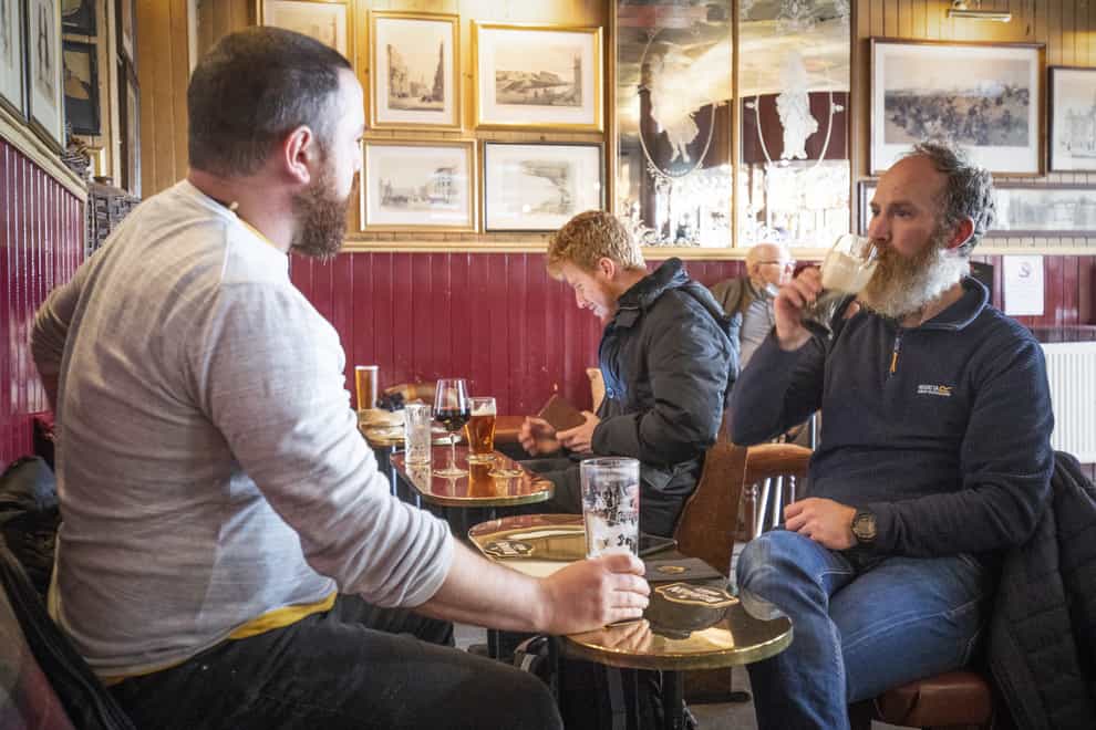 Men drink in pub