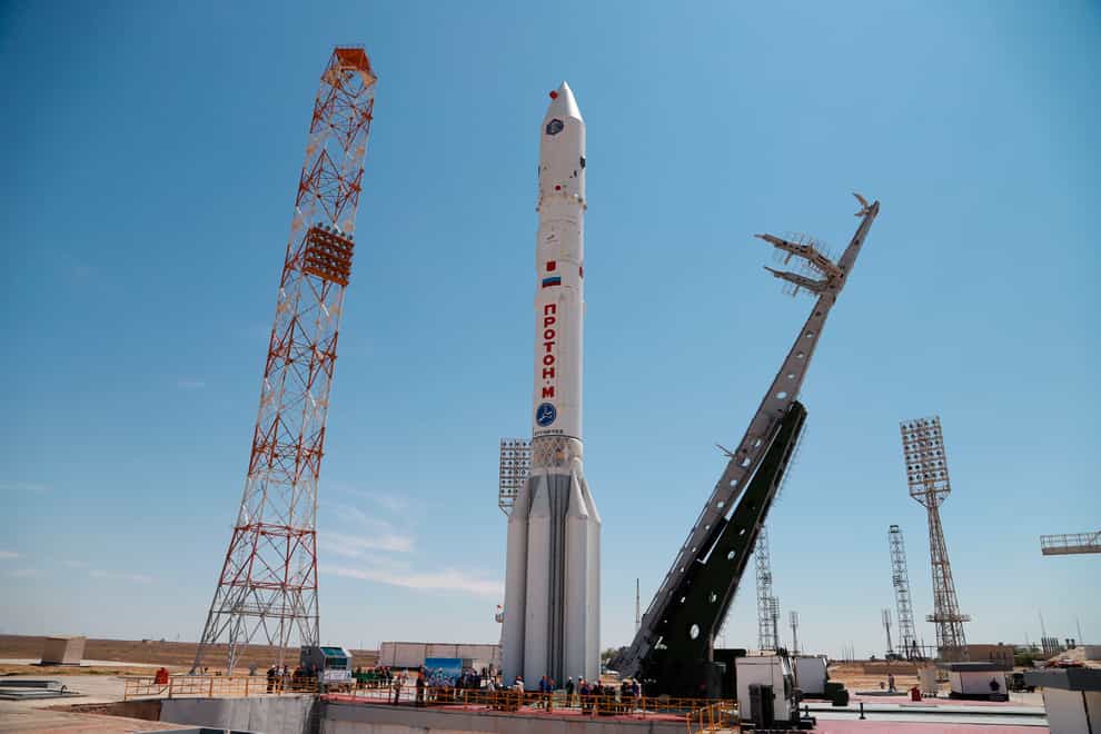 A Proton-M booster rocket carrying the Nauka module stands at the launch pad at Russia’s space facility in Baikonur, Kazakhstan (Roscosmos Space Agency Press Service/AP)