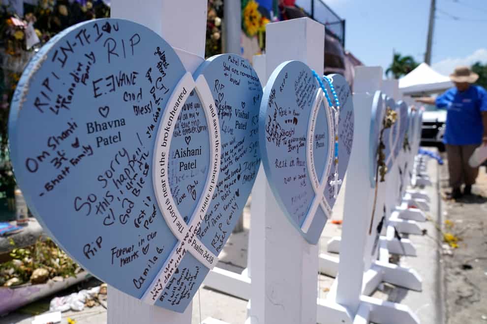 A wooden heart at a makeshift memorial for the victims of the collapse of the Champlain Towers South building (Lynne Sladky/AP)