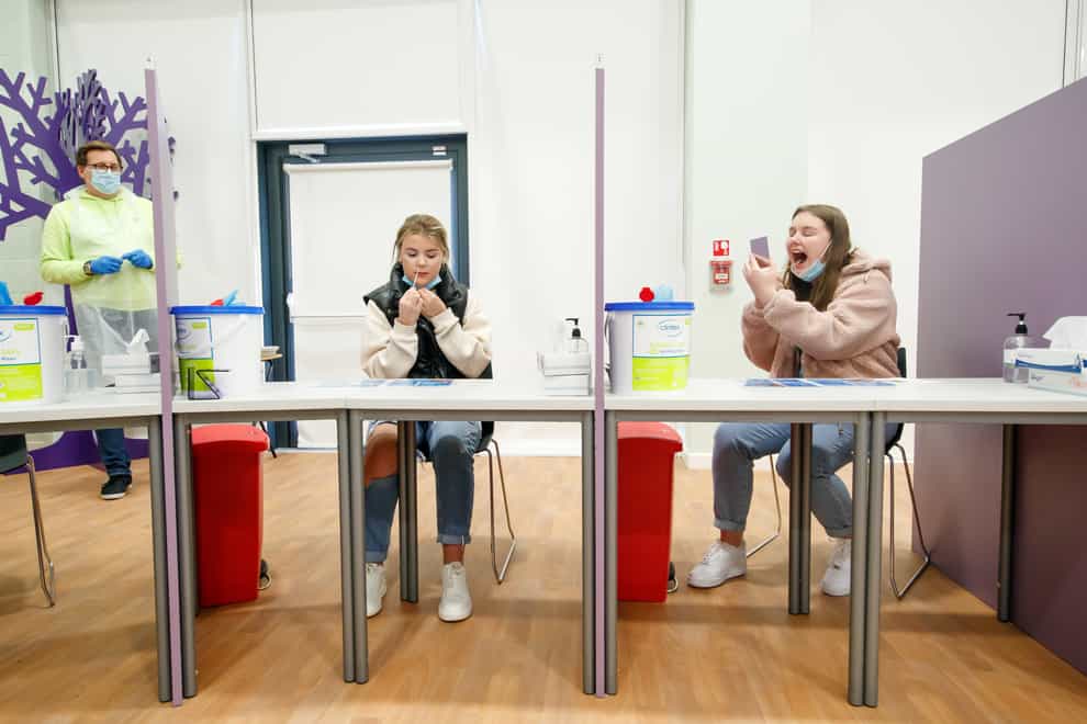 Students Ellie Fisher (left) and Beth Hicks (right) take Coronavirus lateral flow tests at Outwood Academy Adwick in Doncaster (PA)