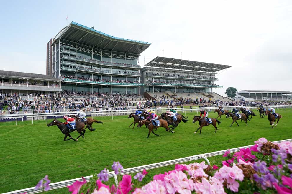 A crowd of up to 30,000 is expected at York racecourse, with Covid-19 restrictions dropped (Martin Rickett/PA)