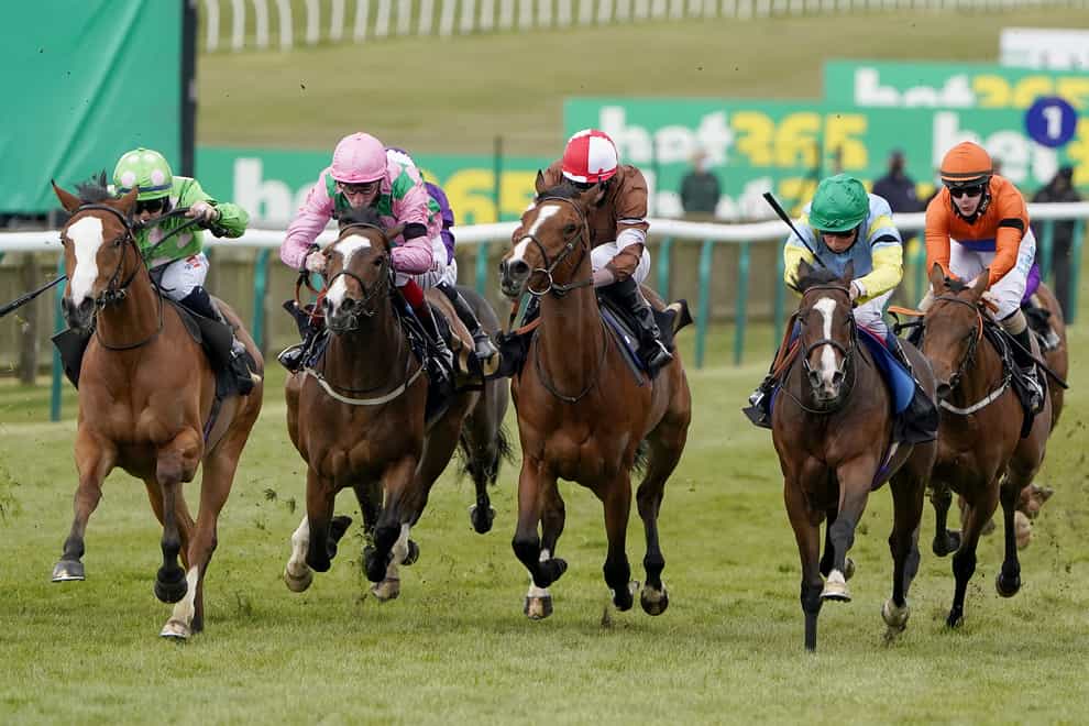 Hollie Doyle riding Desert Dreamer (left) on their way to winning The bet365 British EBF Maiden Fillies’ Stakes at Newmarket Racecourse (Alan Crowhurst/PA)