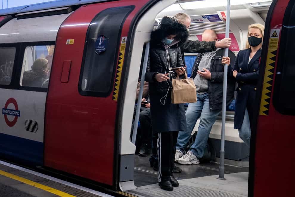 Train operators and Transport for London are cutting services due to staff self-isolating (Aaron Chown/PA)