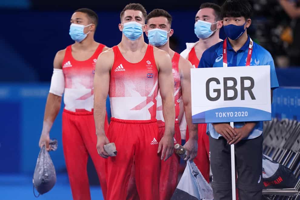 Max Whitlock, second left, gets his gymnastics campaign under way in Tokyo (Mike Egerton/PA)