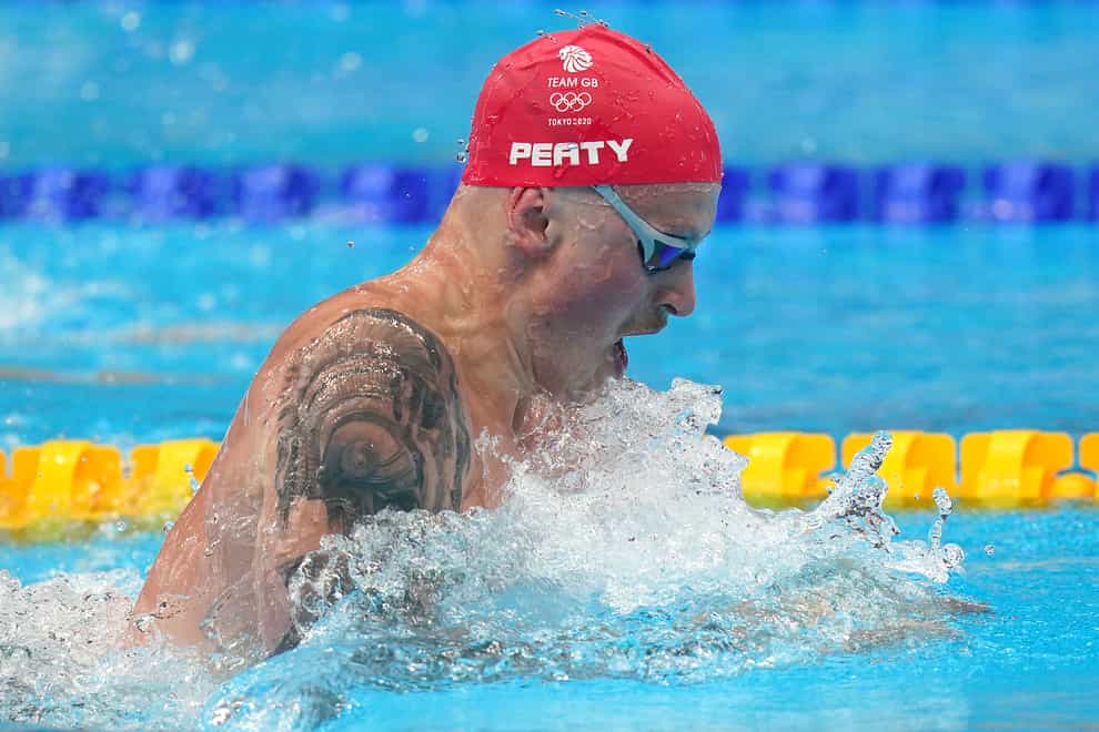 Adam Peaty is through to the semi-finals of the 100m breaststroke (Adam Davy/PA)