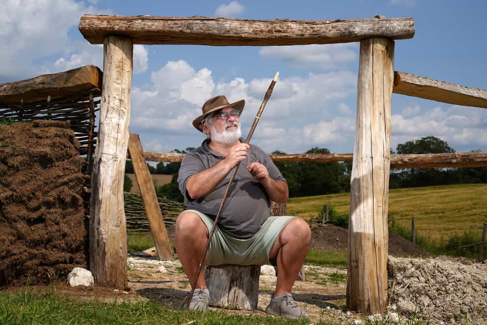 Veteran Kevin Reilly helps with work on a bronze age roundhouse (Andrew Matthews/PA)