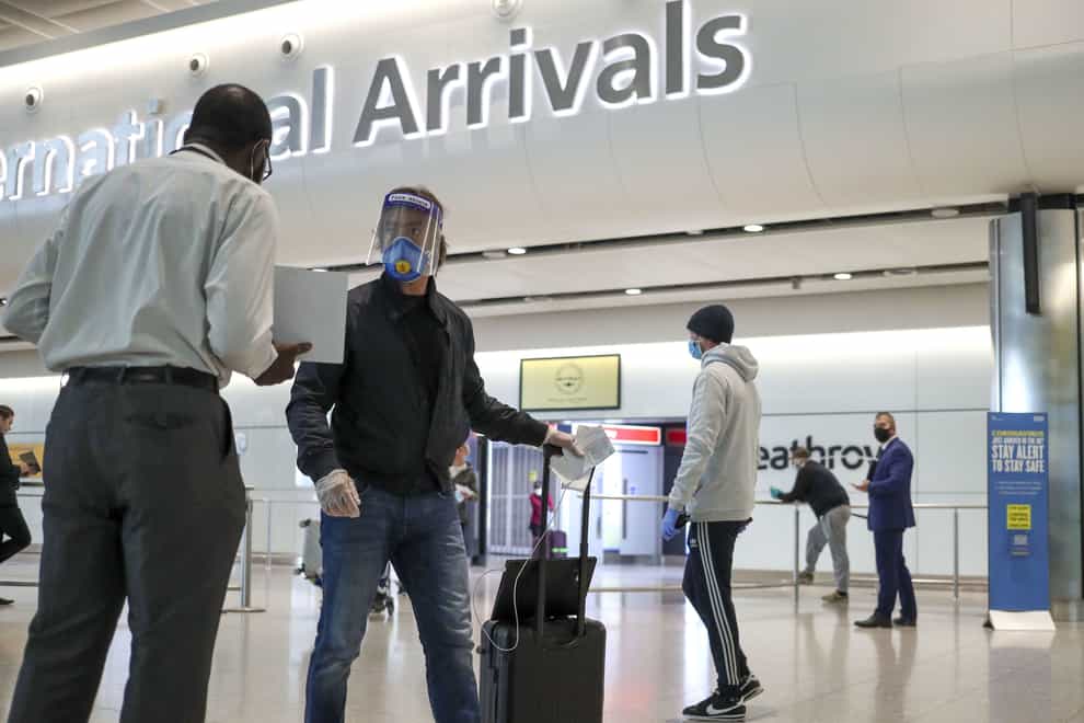 Ministers are preparing to ease travel rules for expats returning to the UK from Sunday, it has been reported (Steve Parsons/PA)