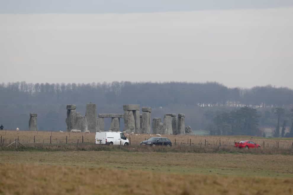 Traffic passes Stonehenge on the A303 road in Wiltshire (Steve Parsons/PA)