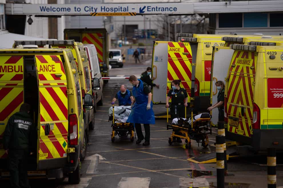 Ambulance crews transport patients into City Hospital in Birmingham at the height of the second wave of coronavirus in January 2021 (Jacob King/PA)