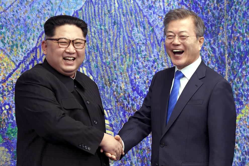 North Korean leader Kim Jong Un and South Korean President Moon Jae-in have agreed to restore suspended communication channels and improve ties (Korea Summit Press Pool/AP)