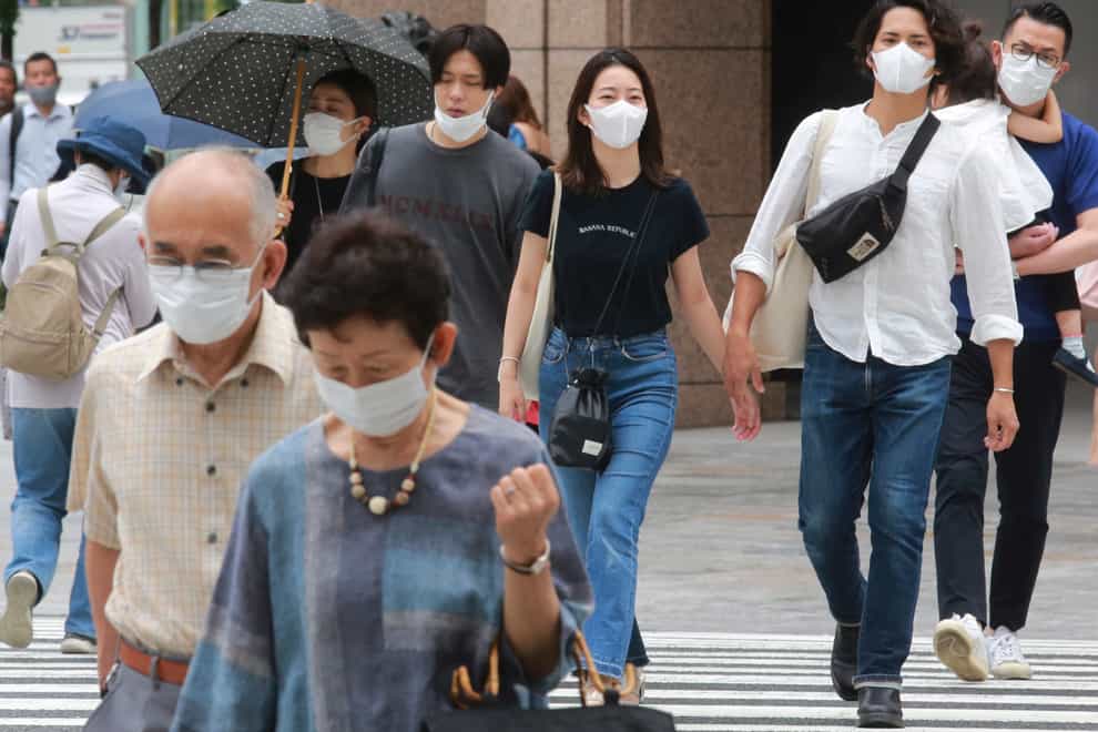 Tokyo has reported its highest daily number of new coronavirus infections, days after the Olympic Games began (Koji Sasahara/AP)