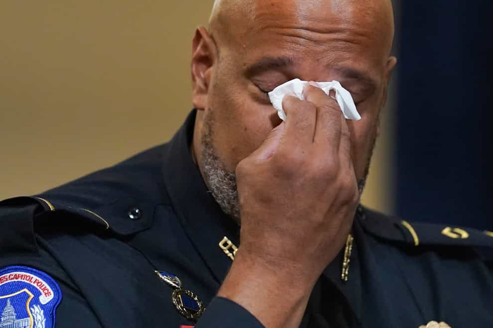 Washington Metropolitan Police Department officer Daniel Hodges wipes his eyes during the House select committee hearing (Andrew Harnik/AP)