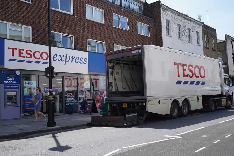 A delivery lorry outside a Tesco Express store in central London (Yui Mok/PA)