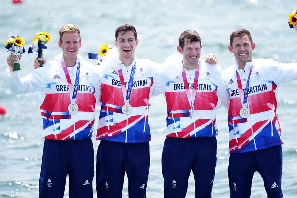 Great Britain’s Harry Leask, Angus Groom, Tom Barras and Jack Beaumont collect their silver medals for the Men’s Quadruple Sculls during the Rowing on the fifth day of the Tokyo 2020 Olympic Games (PA)