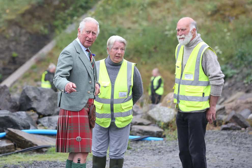 The Prince of Wales wore a kilt as he met Dorcas and Allan Sinclair (Paul Campbell/PA)