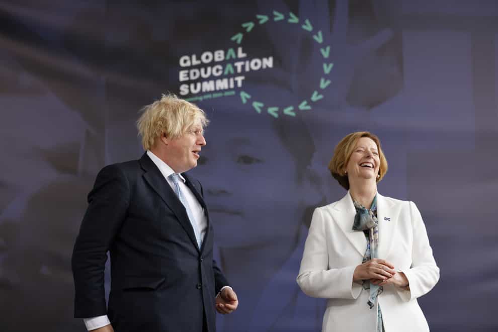 Prime Minister Boris Johnson alongside former PM of Australia Julia Gillard at the Global Education Summit (Tolga Akmen/PA)