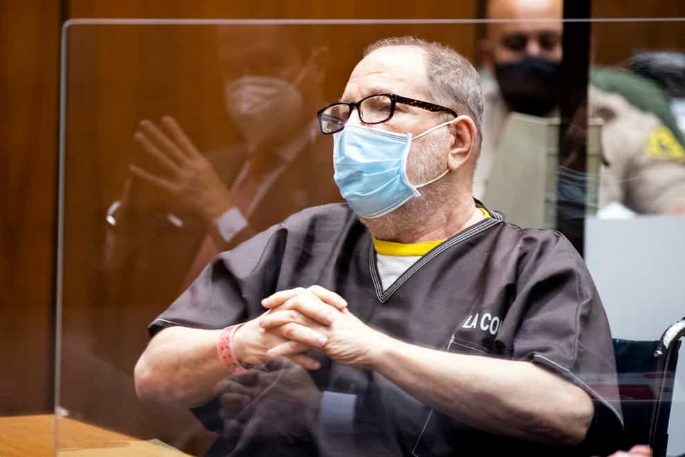 Harvey Weinstein wears a face mask as he listens in court during a pre-trial hearing in Los Angeles (Etienne Laurent/Pool Photo via AP)
