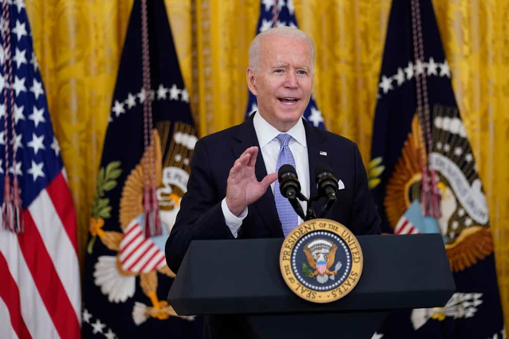 President Joe Biden speaks in the East Room of the White House in Washington (Susan Walsh/AP)