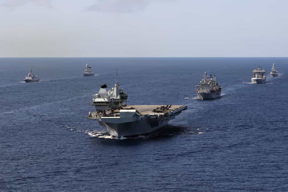 China has warned Britain to ‘remain restrained and obey the rules’ as the Royal Navy’s carrier strike group (CSG) sails through the South China Sea (Ministry of Defence/PA)