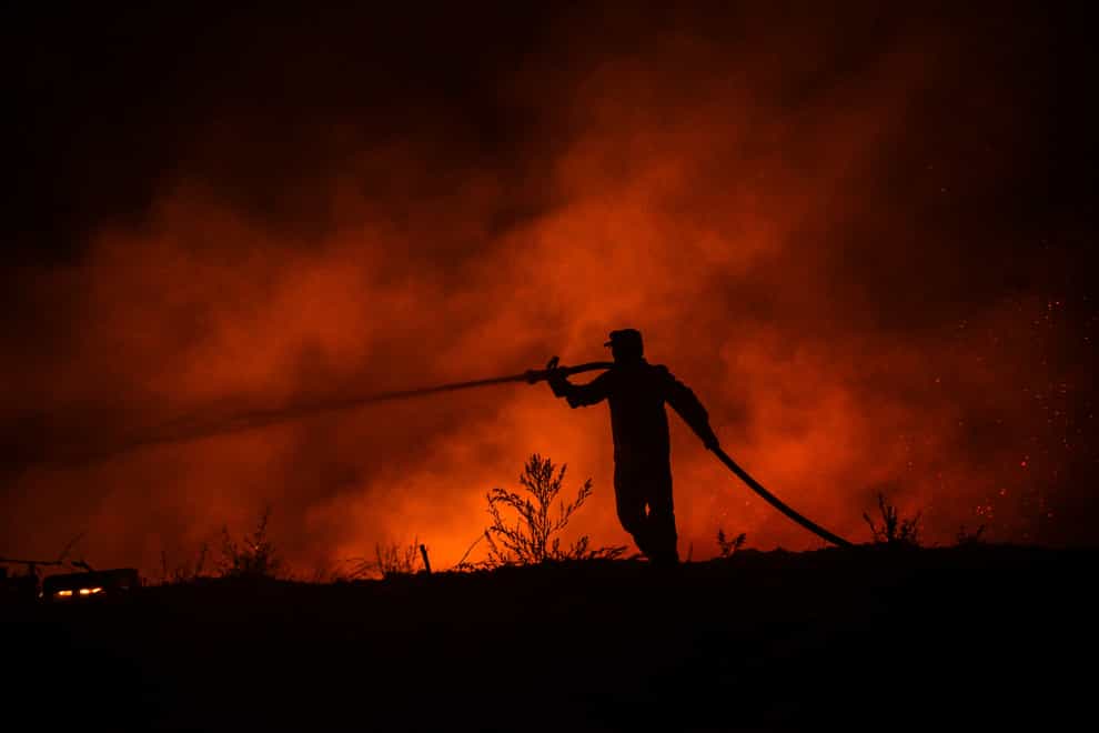 Azerbaijan said it would send 500 emergency response personnel to help Turkey battle the fires (AP)