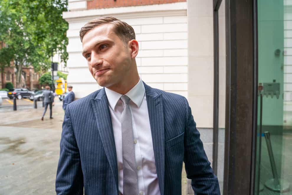 Lewis Hughes, 24, arrives at Westminster Magistrates’ Court in London, where he is charged with common assault, after the Chief Medical Officer for England Chris Whitty, was accosted in St James’s Park, central London, on Sunday June 27. Picture date: Friday July 30, 2021.