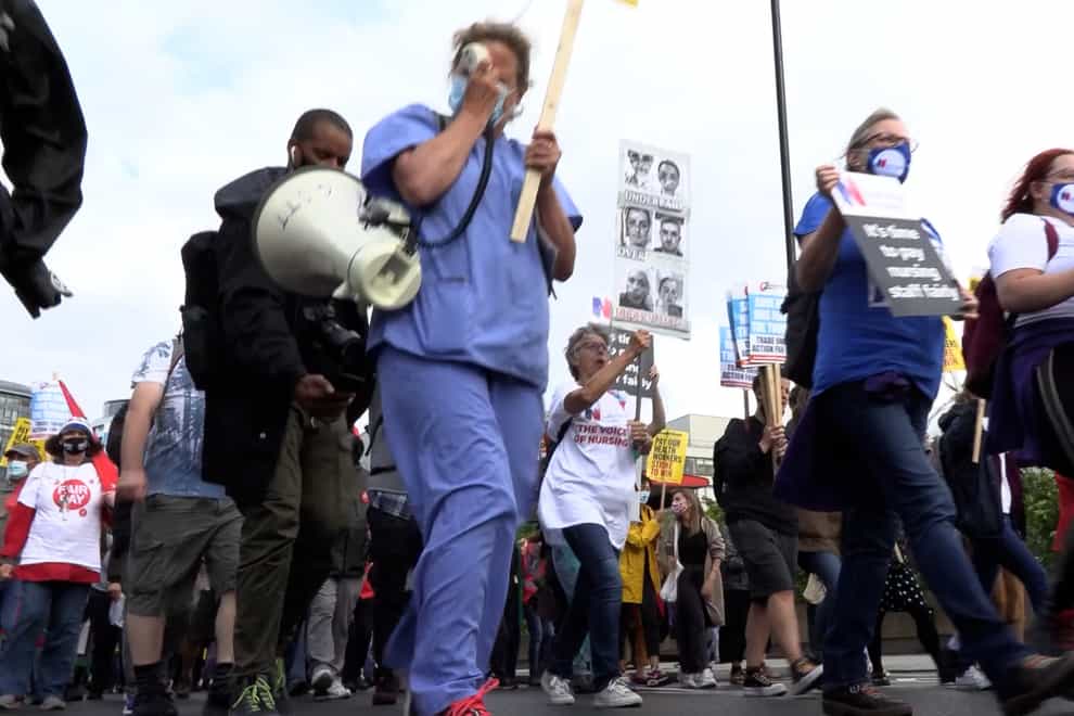 Health workers march to Downing Street (PA Video)