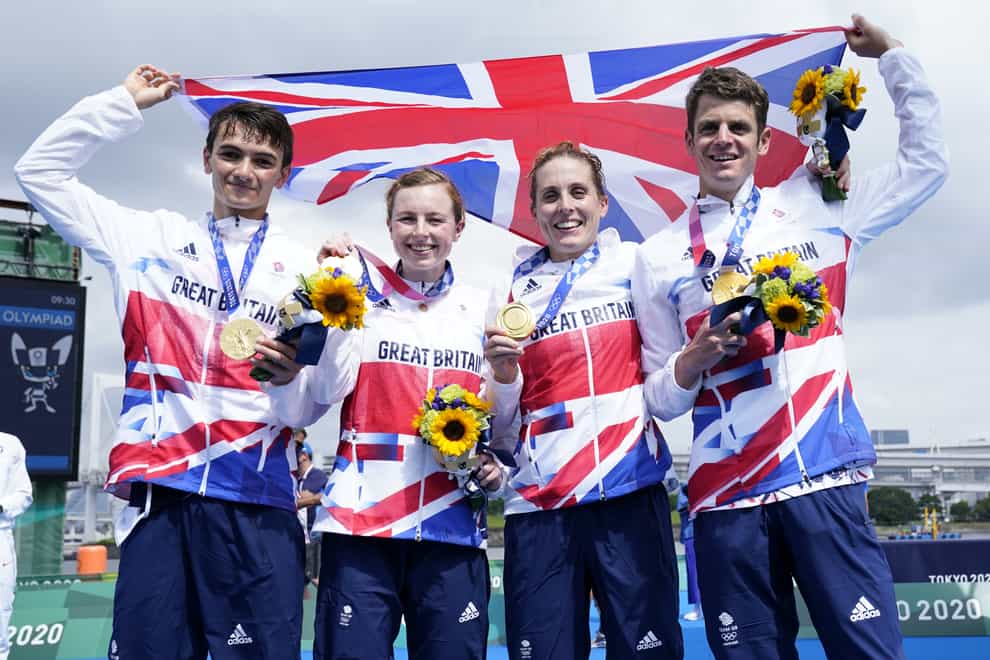 Great Britain’s Alex Yee, Georgia Taylor-Brown Jessica Learmonth and Jonathan Brownlee on the podium with the gold medal for the Triathlon Mixed Relay (Danny Lawson/PA)