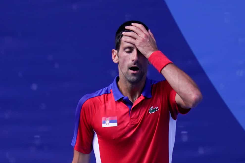 Novak Djokovic shows his frustration during his bronze medal defeat against Pablo Carreno Busta (AP Photo/Seth Wenig)
