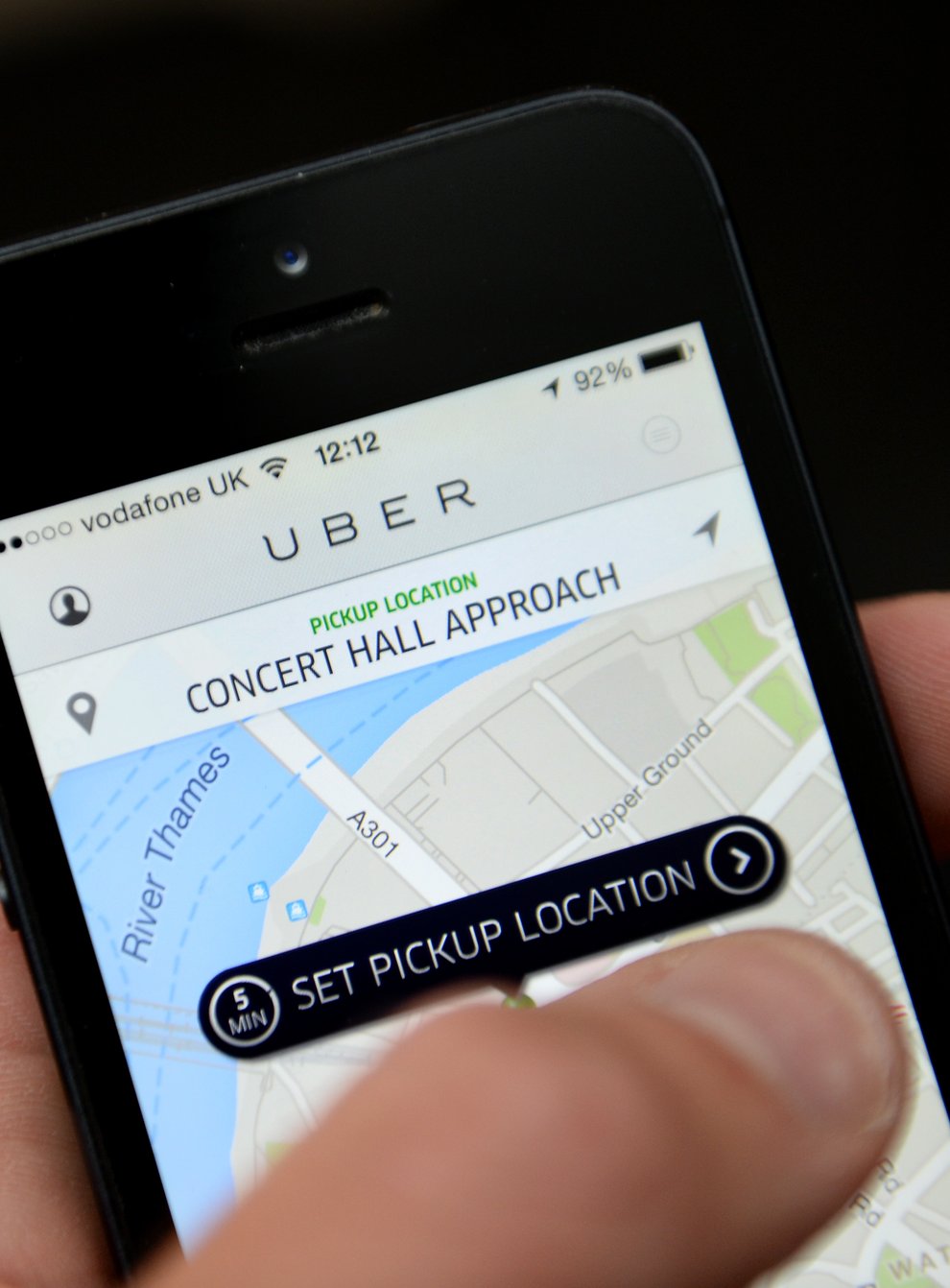Uber will offer discounts to young adults who get a Covid jab (Andrew Matthews/PA)