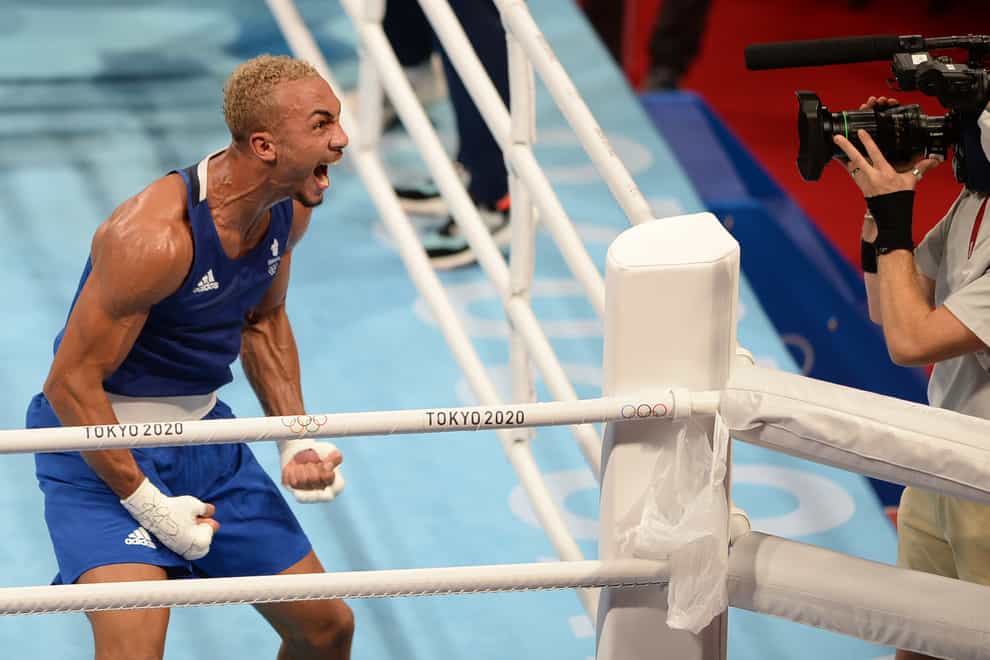 Great Britain’s Benjamin Whittaker celebrates after beating Brazil’s Keno Machado in the Men’s Light Heavy (75-81kg) Quarterfinal 2 at the Kokugikan Arena on the seventh day of the Tokyo 2020 Olympic Games in Japan. Picture date: Friday July 30, 2021.