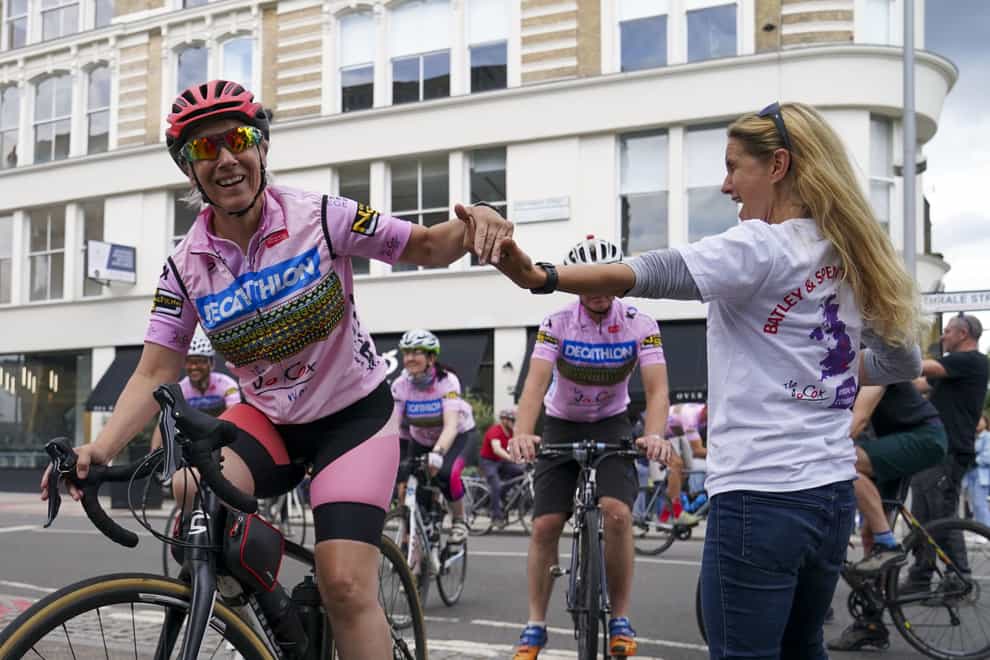 Batley & Spen MP Kim Leadbeater greets the Jo Cox Way cyclists, a group of 70 mixed ability cyclists, at Flat Iron Square in Southwark, London, following their five-day journey from West Yorkshire (Steve Parsons/PA)