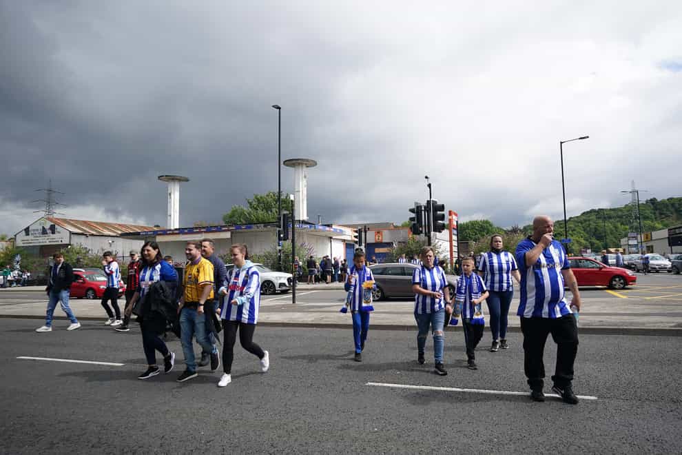 Fans attending for the Carabao Cup first round match between Sheffield Wednesday and Huddersfield at Hillsborough on Sunday were not asked to prove their Covid status (Zac Goodwin/PA)