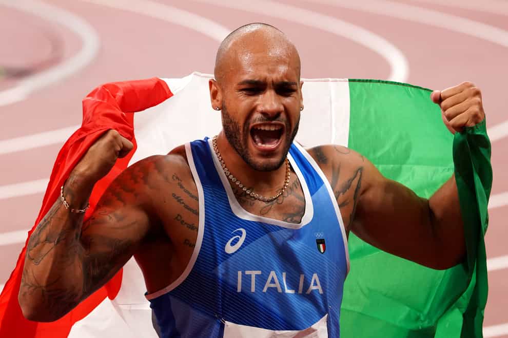 Italy’s Marcell Jacobs celebrates winning the 100m in Tokyo. (Martin Rickett/PA)