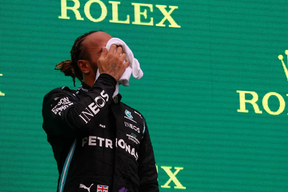 Lewis Hamilton says he has been suffering with symptoms of long Covid (Florion Goga/Pool via AP)