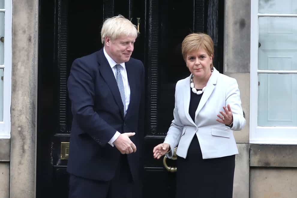 Nicola Sturgeon has invited Boris Johnson to meet her to discuss Covid recovery later this week (Jane Barlow/PA)