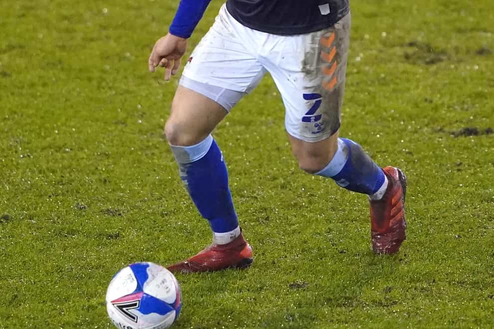 Harry Clarke in action for Oldham (Zac Goodwin/PA)