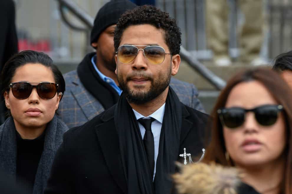 FILE – In this Feb. 24, 2020 file photo, former “Empire” actor Jussie Smollett leaves the Leighton Criminal Courthouse in Chicago. A judge on Monday, Aug. 2, 2021, granted lawyers for Jussie Smollett more time to prepare arguments on several issues, including whether they can introduce a key witness’s previous conviction for battery.Cook County Judge James Linn Linn scheduled the next hearing in the case for Aug. 26. (AP Photo/Matt Marton, File)