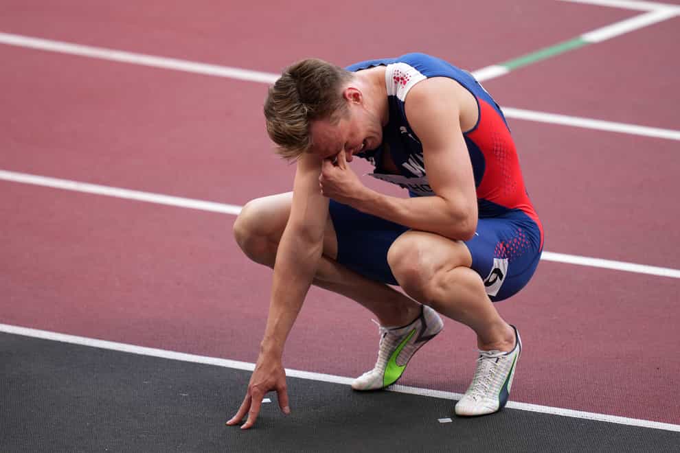 Karsten Warholm reacts after winning the gold medal (Joe Giddens/PA)