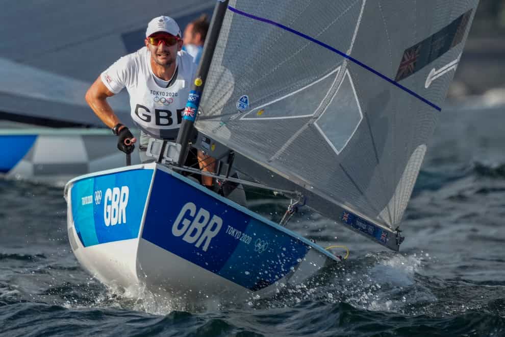 Great Britain’s Giles Scott won gold in the men’s Finn in a dramatic final day of the event in Tokyo (Bernat Armangue/AP)