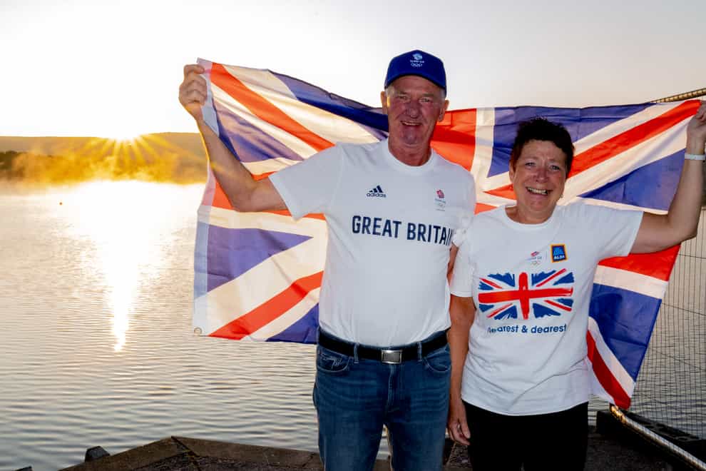 Leslie and Vivian Bithell celebrate after their son Stuart Bithell and his helm Dylan Fletcher won a gold medal in the 49er medal race during the Tokyo 2020 Olympic Games, at Bithell’s home club, Hollingworth Lake Sailing Club, near Rochdale. Picture date: Tuesday August 3, 2021.