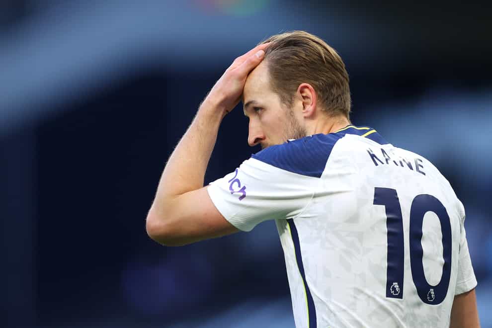 Harry Kane has not reported for training on Monday and Tuesday as he tries and forces a move to Manchester City (Richard Heathcote/PA)
