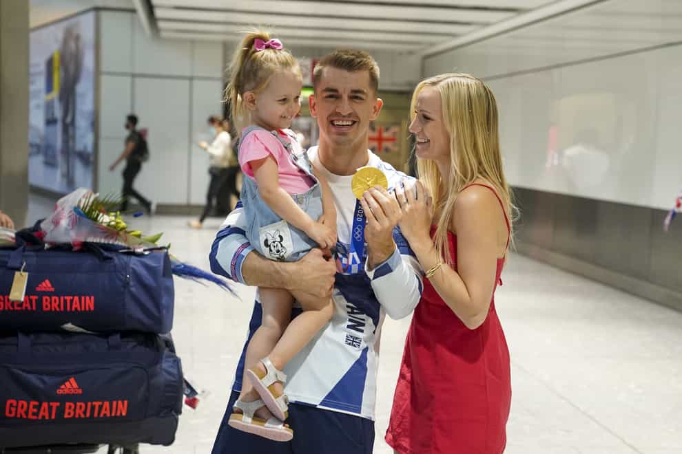 Olympic gymnast Max Whitlock, with his wife Leah and daughter Willow (Steve Parsons/PA)