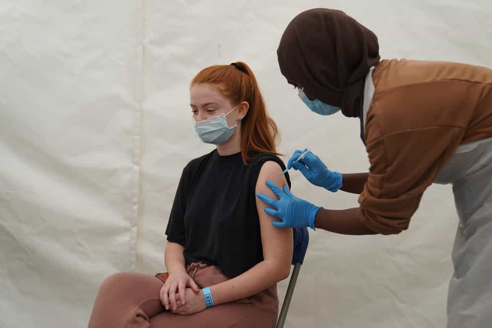 A person receives a Covid-19 jab at a pop-up vaccination centre (Kirsty O’Connor/PA)