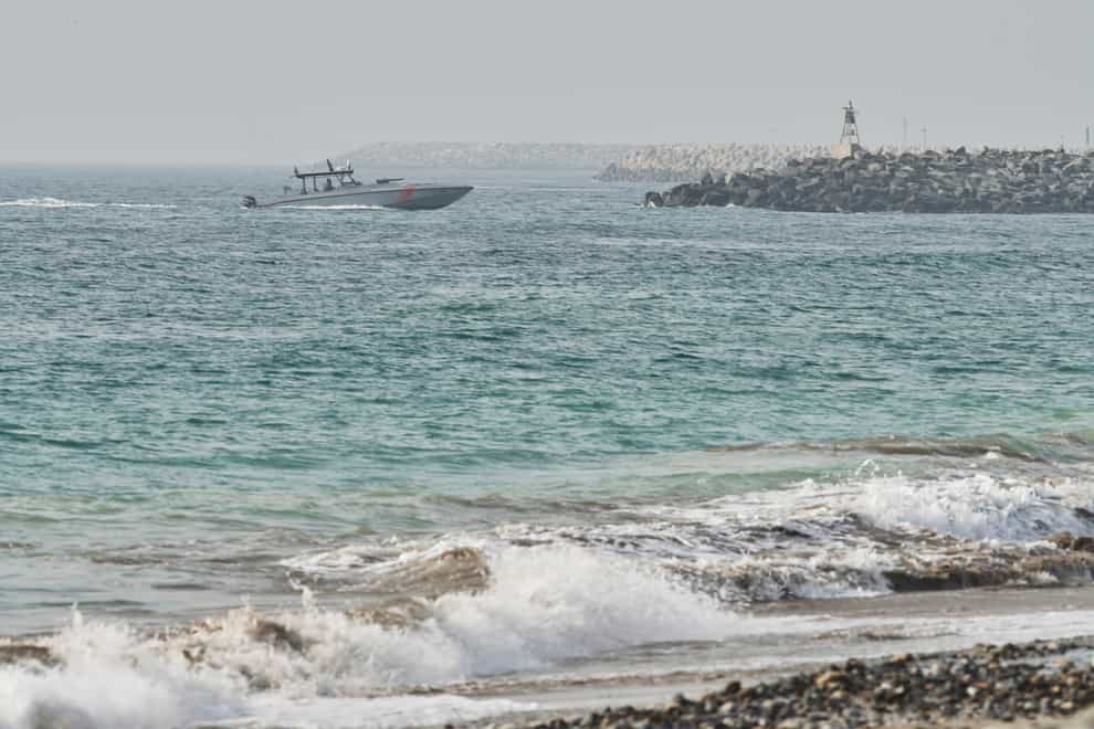 An Emirati Coast Guard vessel patrols off Fujairah, United Arab Emirates, Wednesday, Aug. 4, 2021. The British navy warned of a “potential hijack” of another ship off the coast of the United Arab Emirates in the Gulf of Oman near Fujairah on Tuesday, though the circumstances remain unclear. (AP Photo/Jon Gambrell)