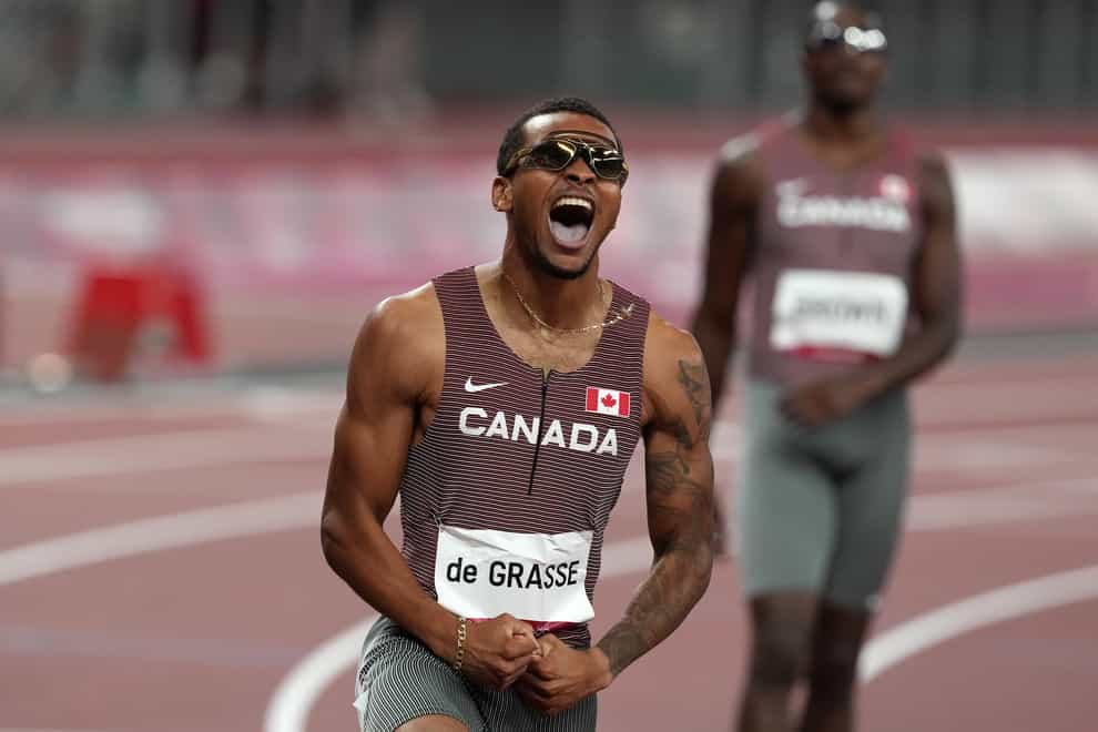 Canada’s Andre De Grasse celebrates gold in the 200m. (Martin Rickett/PA)