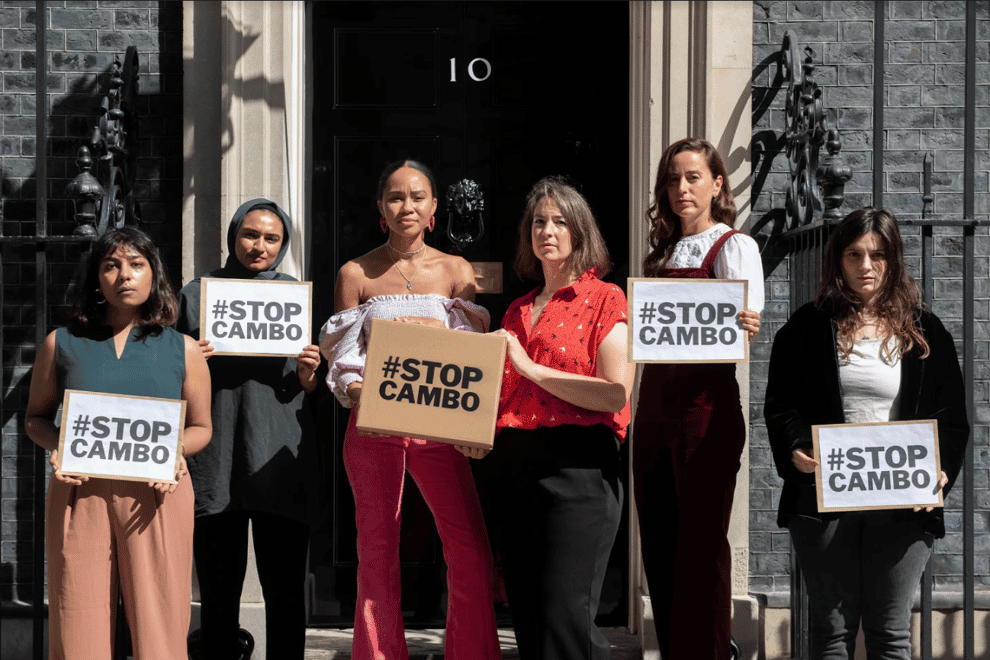 Campaigners hand in an open letter signed by more than 80,000 people to Downing Street opposing the new Cambo oil field off the coast of Shetland (Stop Cambo/David Mirzoeff/PA)