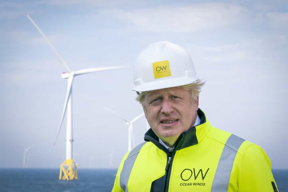 Prime Minister Boris Johnson onboard the Esvagt Alba during a visit to the Moray Offshore Windfarm East, off the Aberdeenshire coast (Jane Barlow/PA)